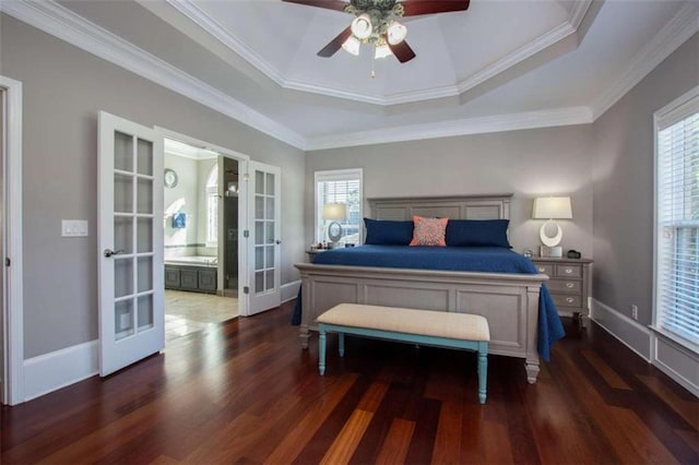 bedroom with ceiling fan, french doors, dark hardwood / wood-style flooring, and a raised ceiling