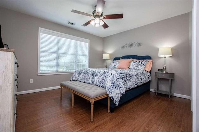 bedroom with ceiling fan and hardwood / wood-style floors