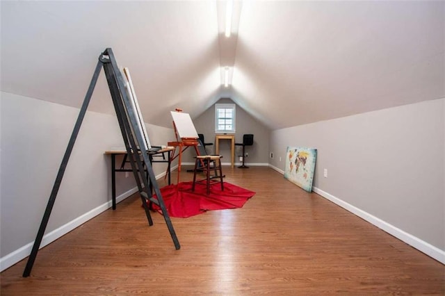 office area featuring lofted ceiling and hardwood / wood-style floors