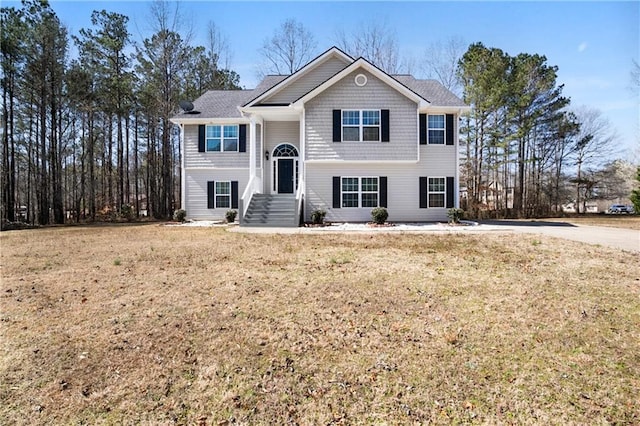 225 Stonewood Ct, Temple, GA 30179 - raised ranch featuring a front yard