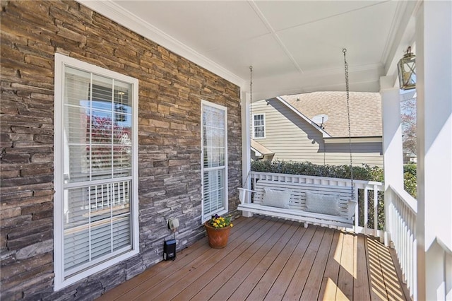 deck featuring covered porch