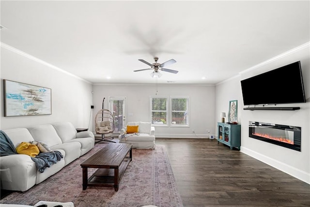 309 Vista Ln, Woodstock, GA 30189 - living room with dark wood-type flooring, crown molding, ceiling fan, and baseboards