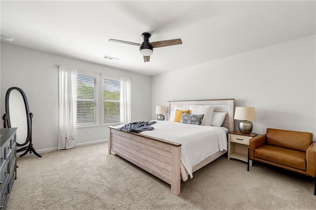 309 Vista Ln, Woodstock, GA 30189 - bedroom with light carpet, visible vents, baseboards, and ceiling fan