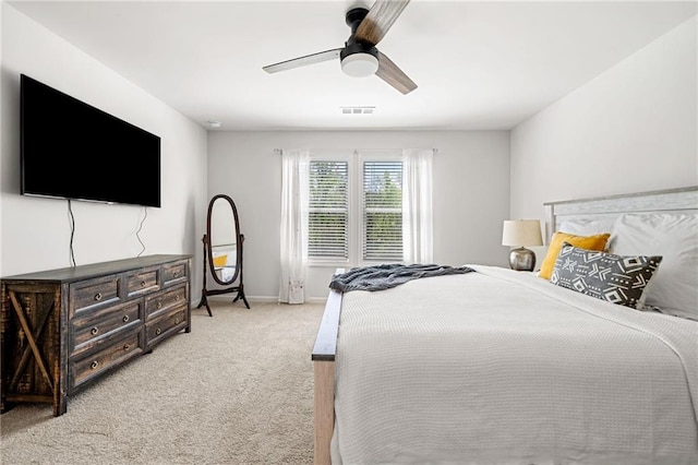 309 Vista Ln, Woodstock, GA 30189 - bedroom featuring baseboards, light colored carpet, ceiling fan, and visible vents