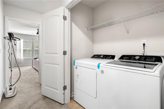 309 Vista Ln, Woodstock, GA 30189 - washroom featuring baseboards, washing machine and dryer, laundry area, and light carpet