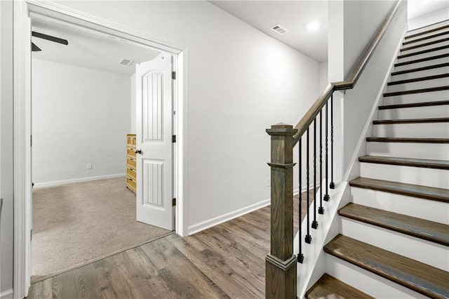 309 Vista Ln, Woodstock, GA 30189 - staircase with wood finished floors, ceiling fan, baseboards, and visible vents