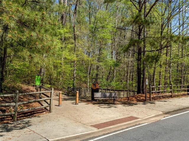 309 Vista Ln, Woodstock, GA 30189 - view of community with a forest view and fence