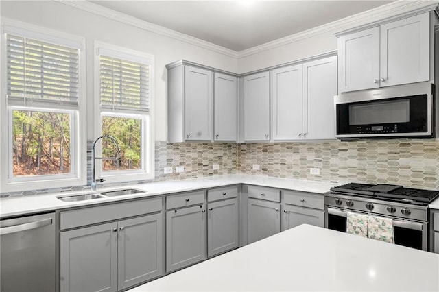 309 Vista Ln, Woodstock, GA 30189 - kitchen featuring a sink, gray cabinets, light countertops, and appliances with stainless steel finishes