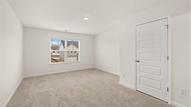 13567 Whitman Ln, Covington, GA 30014 - unfurnished room featuring carpet floors and baseboards