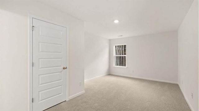 13567 Whitman Ln, Covington, GA 30014 - carpeted spare room featuring baseboards and recessed lighting