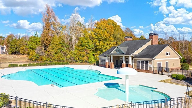13567 Whitman Ln, Covington, GA 30014 - community pool featuring a patio area and french doors