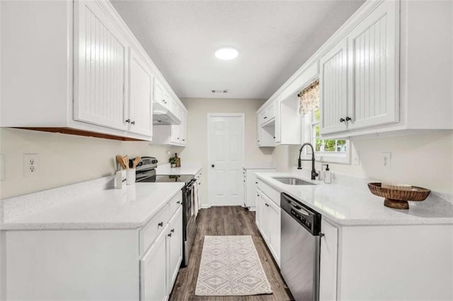 254 Barnesville Rd, Milner, GA 30257 - kitchen featuring white cabinets, stainless steel appliances, dark wood-style floors, and a sink