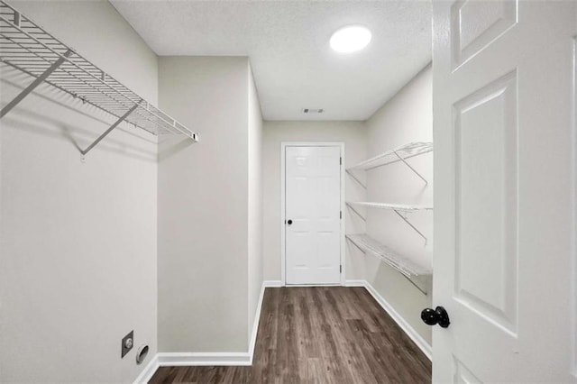 254 Barnesville Rd, Milner, GA 30257 - spacious closet with visible vents and wood finished floors