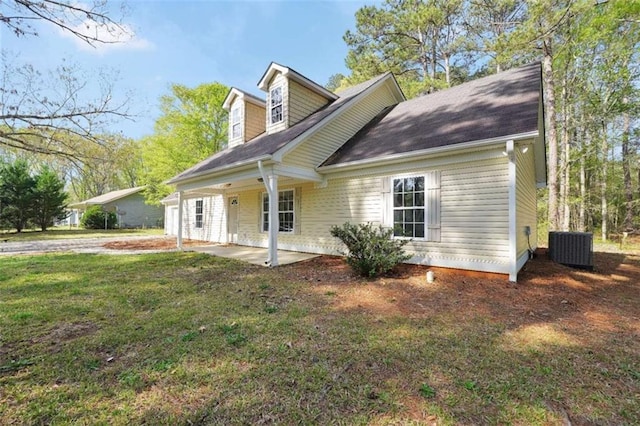 254 Barnesville Rd, Milner, GA 30257 - view of front of home with a front lawn and a patio