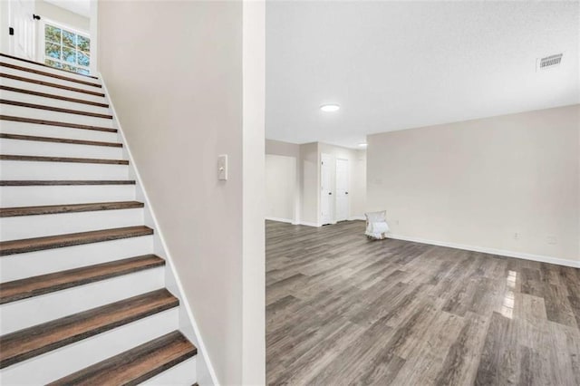 254 Barnesville Rd, Milner, GA 30257 - staircase featuring recessed lighting, wood finished floors, visible vents, and baseboards