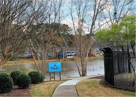 view of property's community featuring a water view