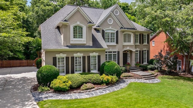 4310 Granby Way, Marietta, GA 30062 - view of front of house featuring stucco siding, concrete driveway, and roof with shingles
