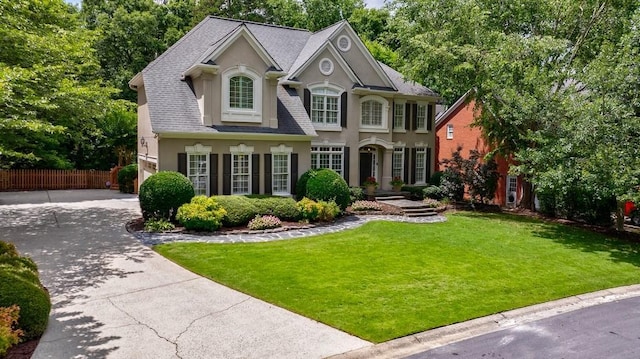 4310 Granby Way, Marietta, GA 30062 - view of front of home with stucco siding, driveway, and roof with shingles