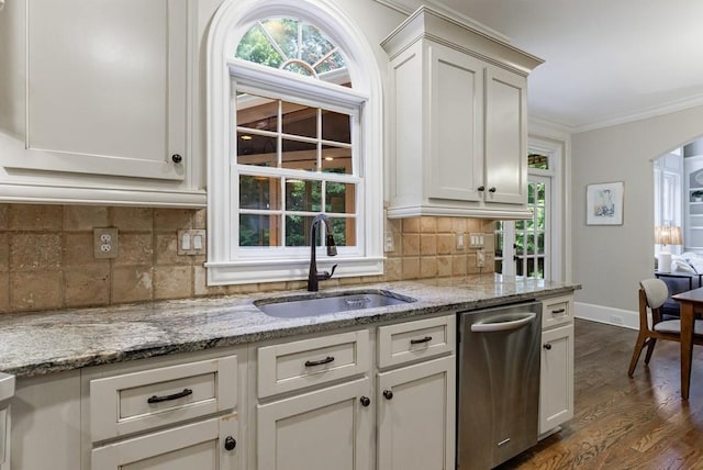 4310 Granby Way, Marietta, GA 30062 - kitchen with dishwasher, plenty of natural light, dark wood-style flooring, ornamental molding, and tasteful backsplash