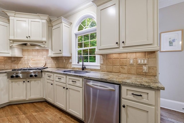 4310 Granby Way, Marietta, GA 30062 - kitchen featuring appliances with stainless steel finishes, wood finished floors, ornamental molding, light stone counters, and backsplash