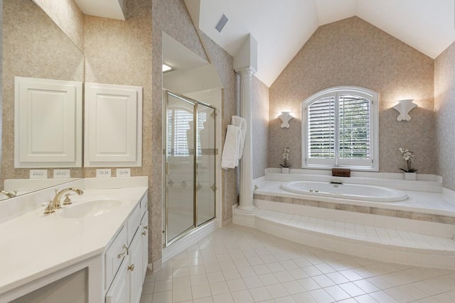 4310 Granby Way, Marietta, GA 30062 - bathroom featuring vanity, a garden tub, lofted ceiling, a stall shower, and tile patterned floors