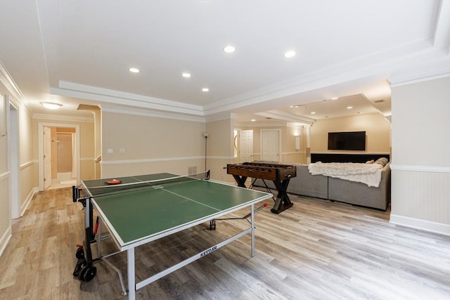 4310 Granby Way, Marietta, GA 30062 - recreation room with a tray ceiling, ornamental molding, light wood-type flooring, recessed lighting, and a wainscoted wall