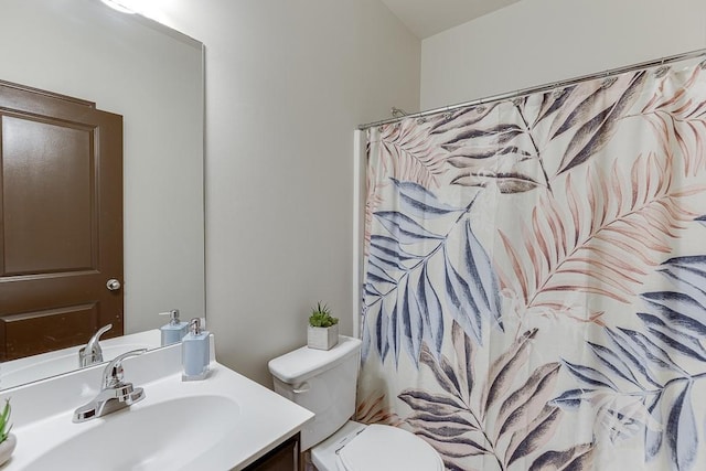 893 Whitfield Oak Rd, Auburn, GA 30011 - full bath featuring vanity, toilet, and a shower with shower curtain