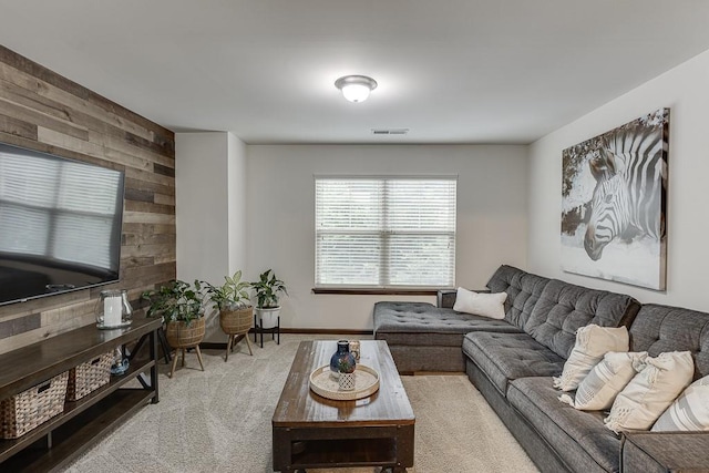 893 Whitfield Oak Rd, Auburn, GA 30011 - living room featuring wood walls, carpet flooring, and baseboards