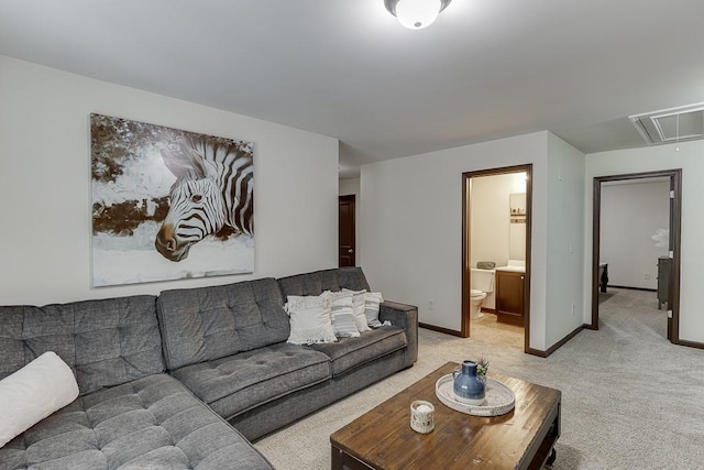 893 Whitfield Oak Rd, Auburn, GA 30011 - living room featuring attic access, light colored carpet, and baseboards