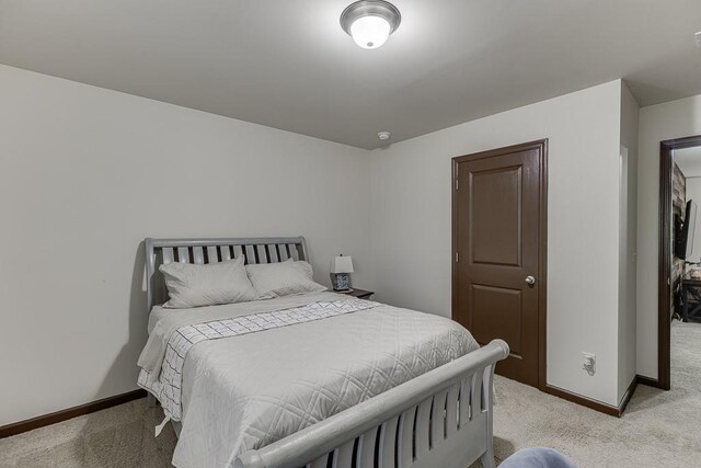 893 Whitfield Oak Rd, Auburn, GA 30011 - bedroom featuring light colored carpet and baseboards