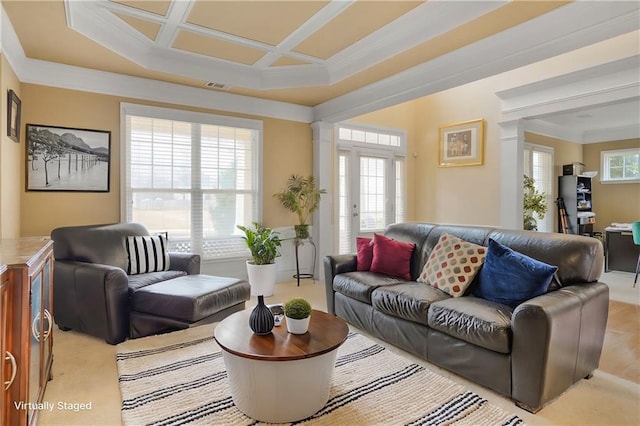 living area featuring visible vents, light colored carpet, ornamental molding, and coffered ceiling