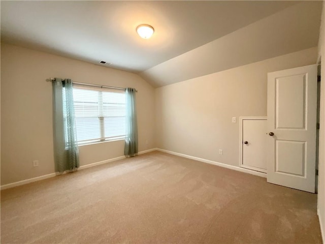 bonus room with lofted ceiling, baseboards, visible vents, and carpet flooring