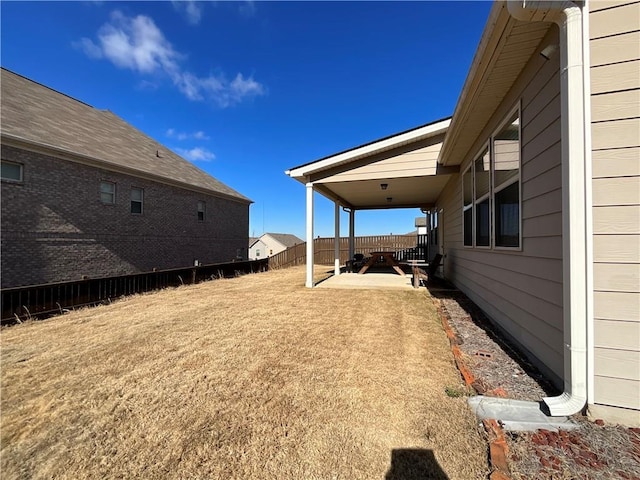 view of yard featuring a patio area and fence