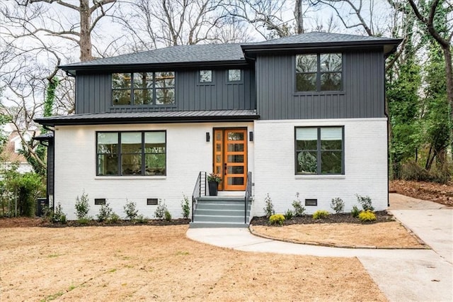 modern inspired farmhouse with brick siding, crawl space, and a shingled roof