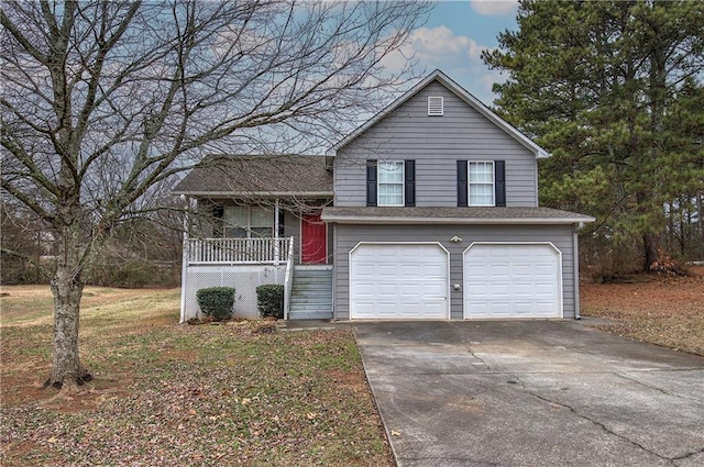 view of front of property featuring a garage and covered porch