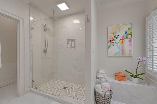 bathroom with a marble finish shower, marble finish floor, and crown molding