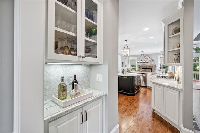 7025 Windsor Hill Psge, Suwanee, GA 30024 - bar area with plenty of natural light, stainless steel appliances, decorative backsplash, and recessed lighting
