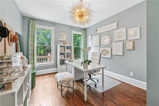 7025 Windsor Hill Psge, Suwanee, GA 30024 - home office with a chandelier and wood finished floors