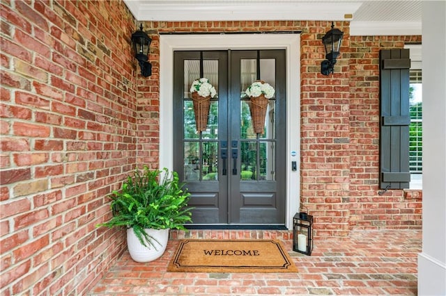 7025 Windsor Hill Psge, Suwanee, GA 30024 - property entrance featuring french doors and brick siding