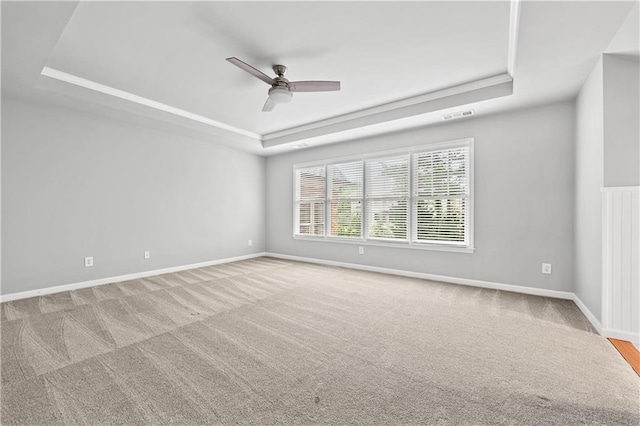 7025 Windsor Hill Psge, Suwanee, GA 30024 - carpeted spare room featuring a raised ceiling and a ceiling fan