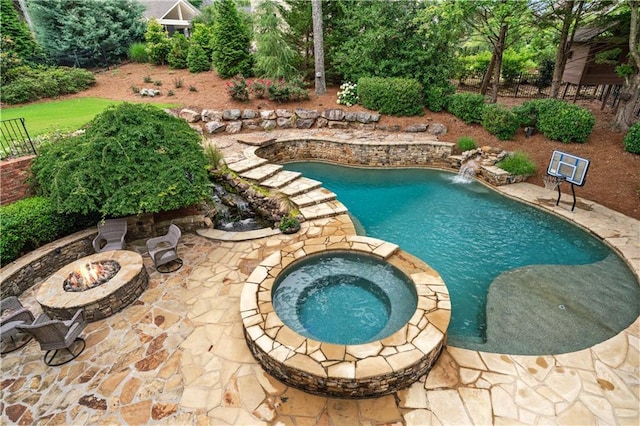7025 Windsor Hill Psge, Suwanee, GA 30024 - view of swimming pool with an outdoor fire pit, a patio area, and a pool with connected hot tub