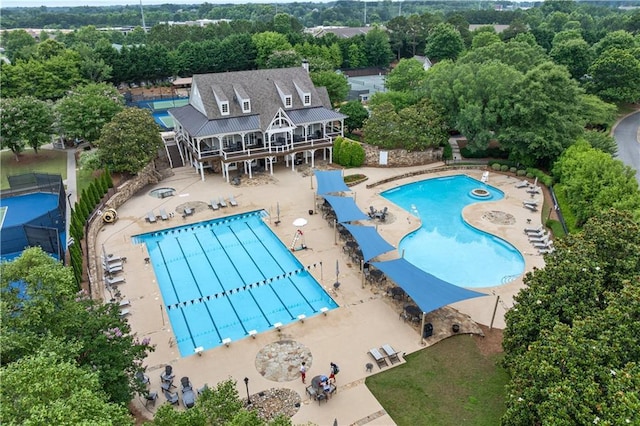 7025 Windsor Hill Psge, Suwanee, GA 30024 - community pool featuring a patio area and a wooden deck