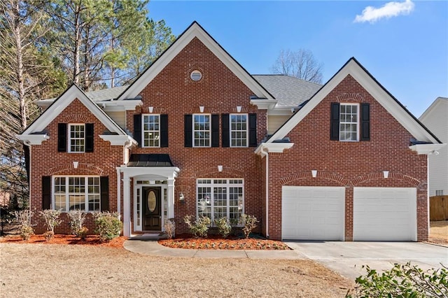 front facade with a garage