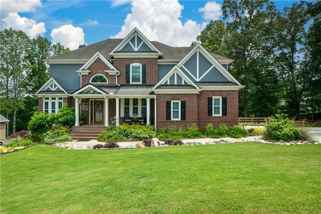 2637 Morningside Trl NW, Kennesaw, GA 30144 - view of front of home with a front yard, brick siding, and covered porch