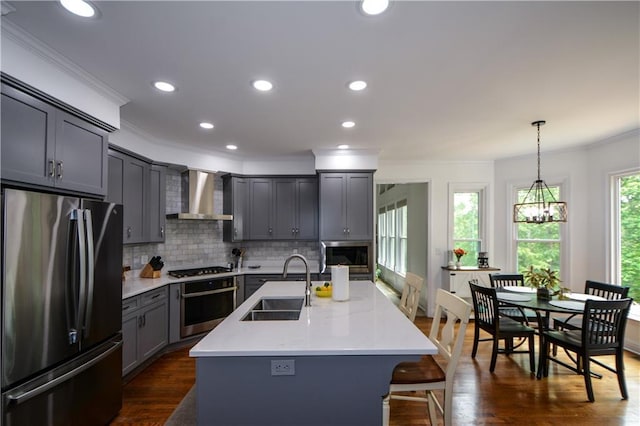2637 Morningside Trl NW, Kennesaw, GA 30144 - kitchen with appliances with stainless steel finishes, a sink, ornamental molding, wall chimney exhaust hood, and light countertops