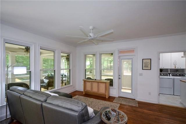 2637 Morningside Trl NW, Kennesaw, GA 30144 - living area with washing machine and clothes dryer, ceiling fan, crown molding, wood finished floors, and baseboards