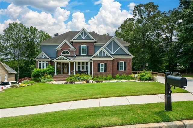 2637 Morningside Trl NW, Kennesaw, GA 30144 - view of front of house featuring a front yard, brick siding, and a porch