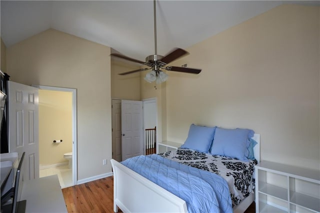 2637 Morningside Trl NW, Kennesaw, GA 30144 - bedroom featuring lofted ceiling, wood finished floors, baseboards, ensuite bath, and ceiling fan