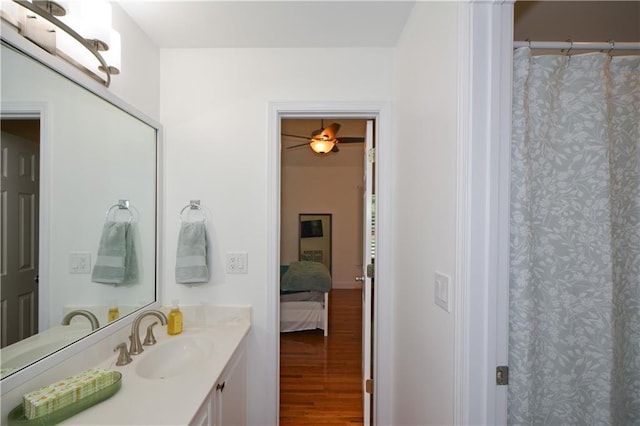 2637 Morningside Trl NW, Kennesaw, GA 30144 - ensuite bathroom featuring wood finished floors, vanity, and ceiling fan