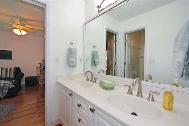 2637 Morningside Trl NW, Kennesaw, GA 30144 - bathroom with double vanity, wood finished floors, and a ceiling fan